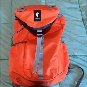 EUC Cotopaxi Tapa 22L Backpack-Cada Dia in the color Tamarindo